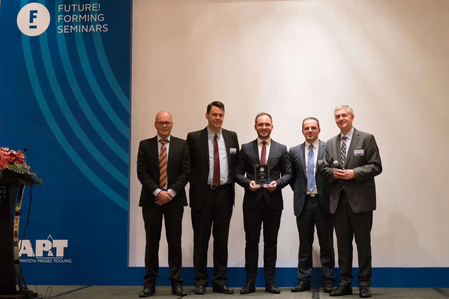 During the seminar in Shanghai, AP&T received the University of Kassel's new distinction, Certificate of PHS Team Excellence, for outstanding progress in press hardening. From left, AP&T's general manager in China Kari Rannisto, Dr. Martin Skrikerud and Dr. Christian Koroschetz from AP&T's R&D Center, Agim Ademaj and Prof. Dr. Kurt Steinhoff from the University of Kassel. 